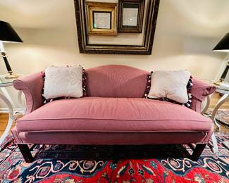 Vintage camelback sofa