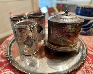 Candle holders (L) and other silver-plate items