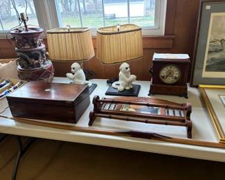 pair of monkey lamos, antique rack, antique writing desk, and pottery lamp
