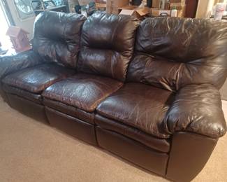 Leather sofa with reclining ends