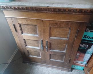 Antique cabinet with marble top