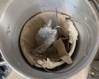 Item #89 inside of propane cooker 