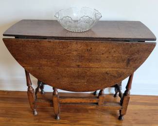 An 18th century English Gate Leg Table.