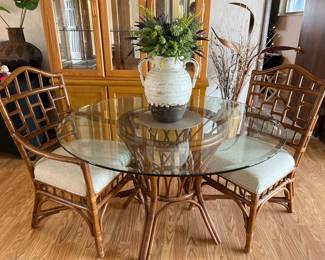 Glass round table with two chairs