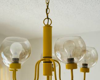 Vintage metal chandelier with glass globes 