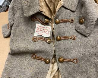 Antique Clothing With the Doll