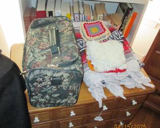 Mexican blanket, potholders, carry on luggage