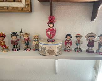 Disney - It's a Small World Music Box Collection. Set includes 10 pieces. Musical base and 9 figurines. When figurine is placed on Music box base, the music plays the song associated with that character and country.