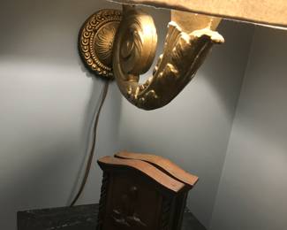 The other wall lamp above a pair of Abe Lincoln book ends!