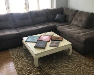 Baker furniture coffee table in front of a 2 piece sectional!
