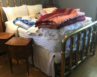 Full size brass bed frame. Quilts and Chenille bedspreads! Pair of matching nightstands!