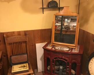 Gas fireplace with remote. Dresser topper with mirror old chandeliers!