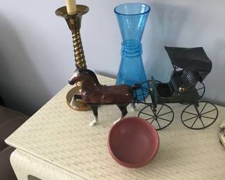 Brass twisty lamp shines down on a Blue crackle glass vase!