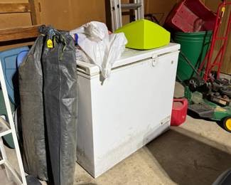 GE upright refrigerator and a 10 x 10 gazebo (vintage one in 2 bags) 