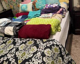 Sleigh bed, dresser and night stand. Linens, blankets and decorative pillows