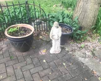 Statues and planters (fence not for sale)