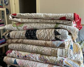 Lots of handstitched quilts