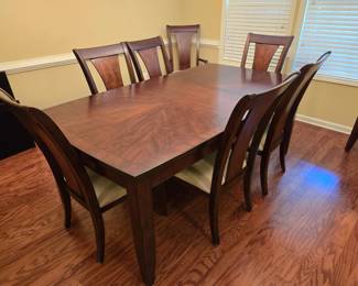 Nice Dining Table with 8 Chairs (includes extra leaf and pads)