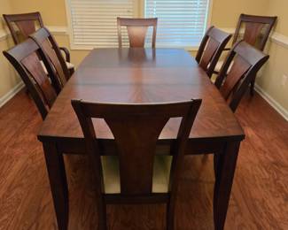 Nice Dining Table with 8 Chairs (includes extra leaf and pads)