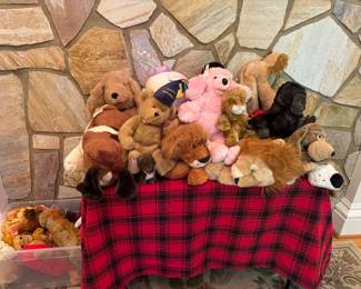 Tons of stuffed animals and beanie beanies