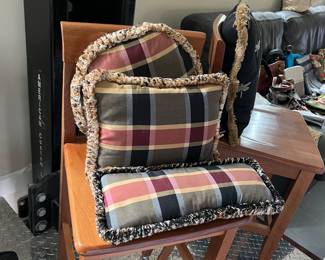 2 stools and throw pillows