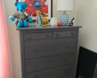 Contemporary chest-of-drawers and colorful home decor