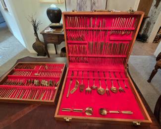 Large set of gold-tone flatware 