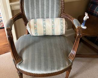 Elegant armchair with blue upholstery