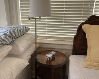 One of a pair of lamps and one of a pair of endtables
