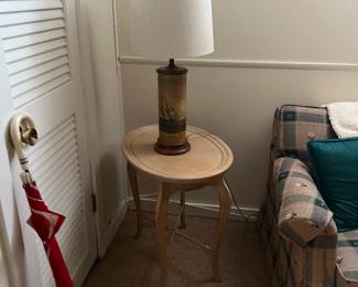 Lamp, table and umbrella