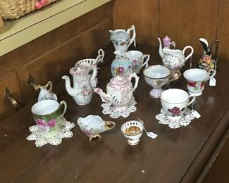 Tea pitcher and cup collection