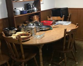Kitchen nook table and chairs, pots and pans
