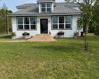 Remodeled 1908 Farmhouse with outbuildings and many luxury items. Come look at the house!