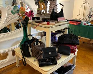 Several DESIGNER purses/bags