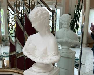 One of many busts on a pedestal