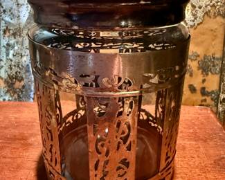 A late 1800s heavily carved silver caged glass tobacco jar circa 1880s