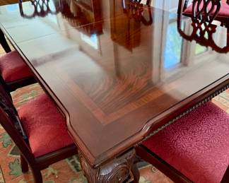 Fabulous flame mahogany dining table with 6 side chairs and two armchairs.