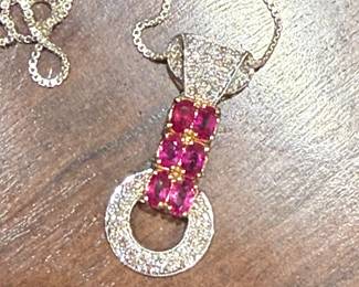 Modern white gold large necklace with brilliant diamonds and pink sapphires