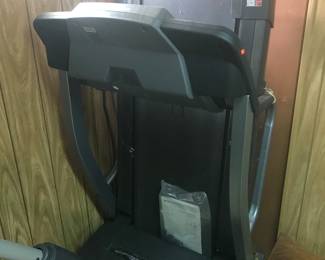 Low miles on this treadmill! Holds clothing too!