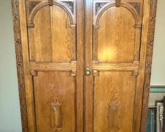 Vintage carved oak armoire