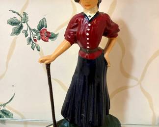 Cast iron painted golfer doorstop