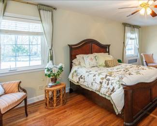 Queen size bed,    wing back chairs, wicker side tables,  bid all separately