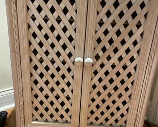 Lovely light wicker cabinet