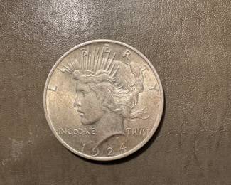 #182 - $43- 1924 Morgan silver dollar.