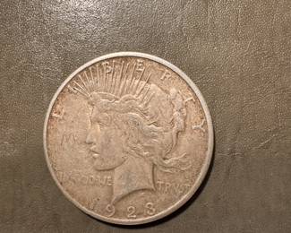 #180 - $43 - 1923 Morgan silver dollar.