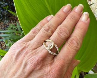 #169 - $800 - Approx 1/2 ct loop ring 14kt gold 4.6 grams. Size 9 1/4