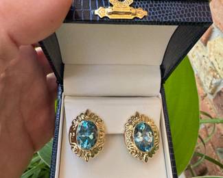 #172 - $750 - Pair of large blue topaz earrings on 14kt yellow gold french back post.