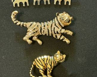 Brooches: Mexican sterling (top), Hattie Carnegie (middle), and Kenneth Jay Lane (bottom)