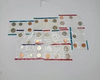 Coin Proofs in Clear Opened Plastic