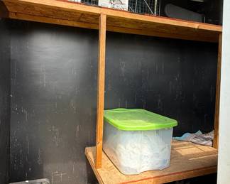 The smaller grey shed was used to shelter feral cats in the winter.